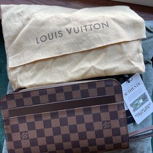 Louis Vuitton St. Louis clutch.